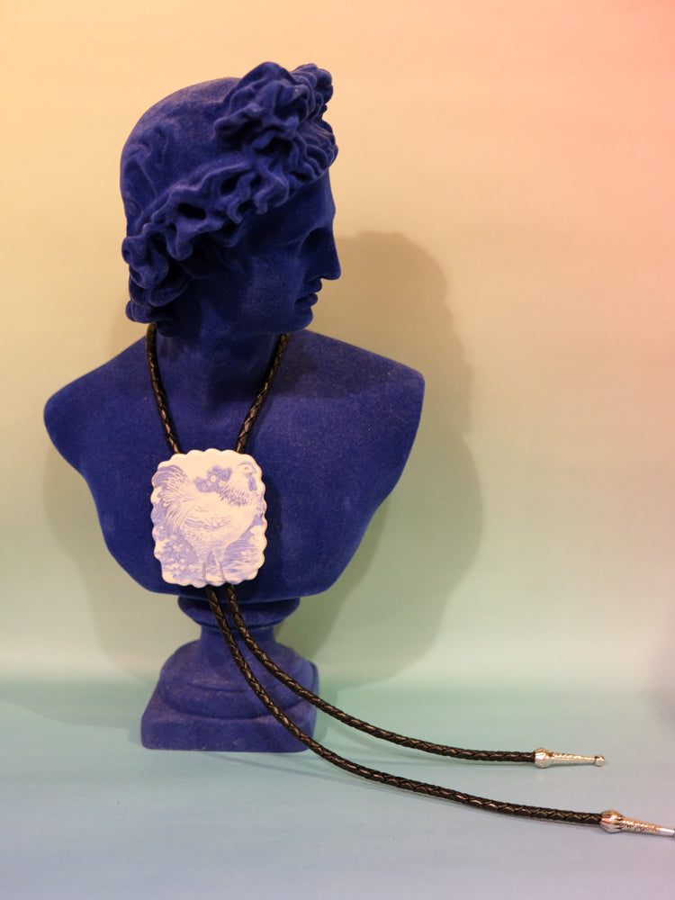 Bolo Tie: Chicken Biscuit (Black Cord)