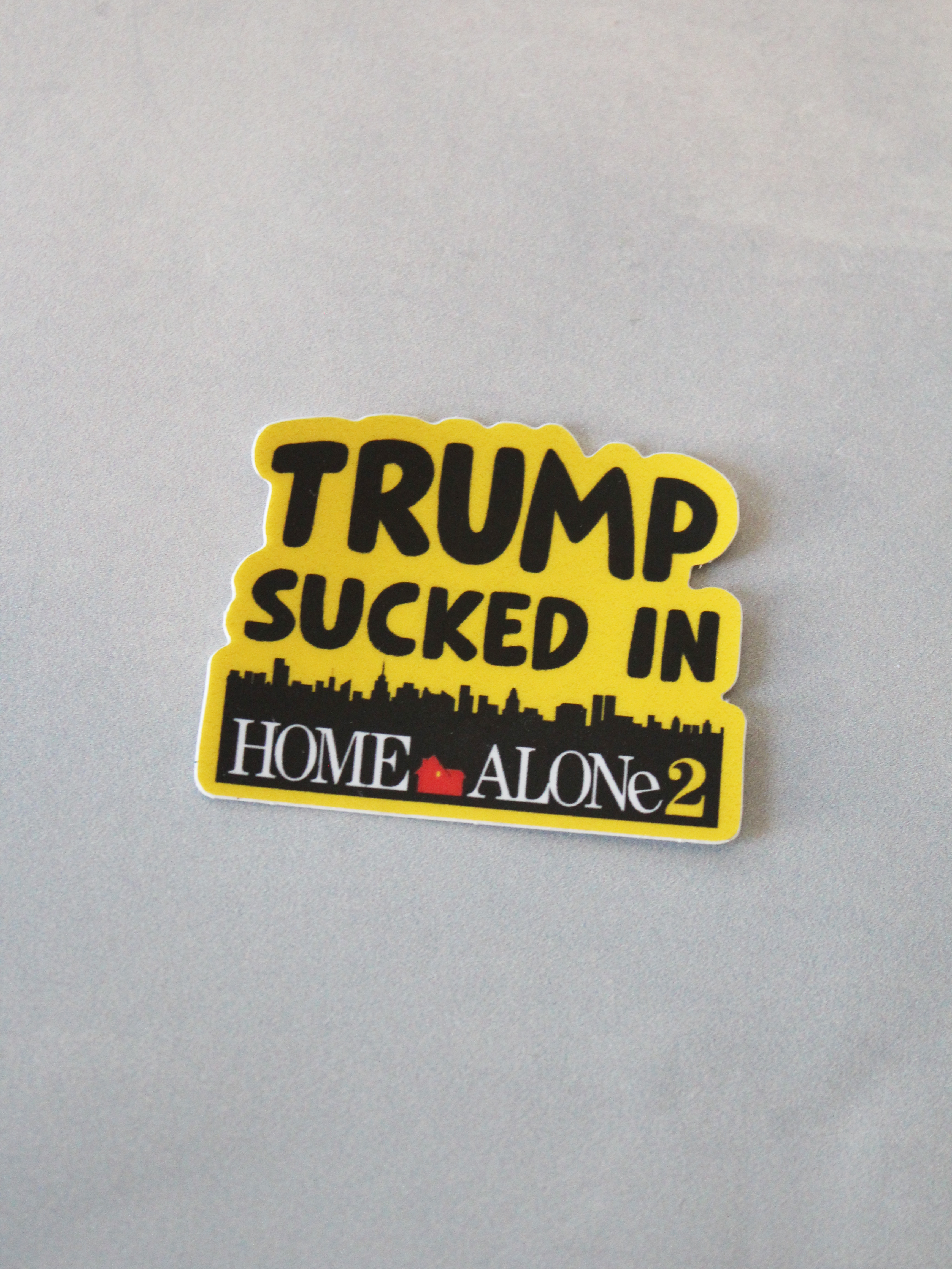 Trump Sucked in Home Alone 2 Sticker