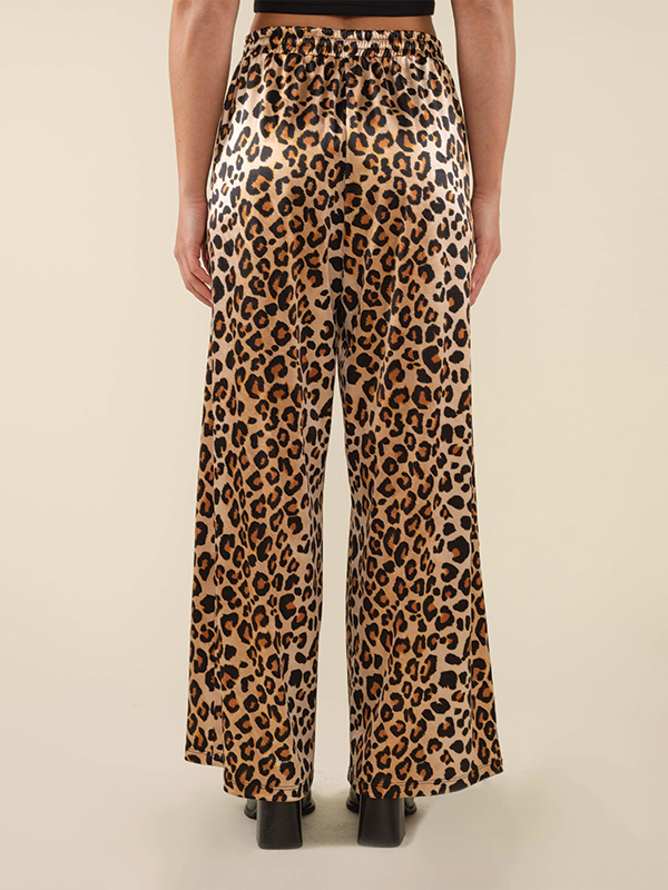 Leopard print satin pants with a straight leg fit, offering a bold and stylish look with a smooth, shiny finish, perfect for adding a touch of edge to your wardrobe.