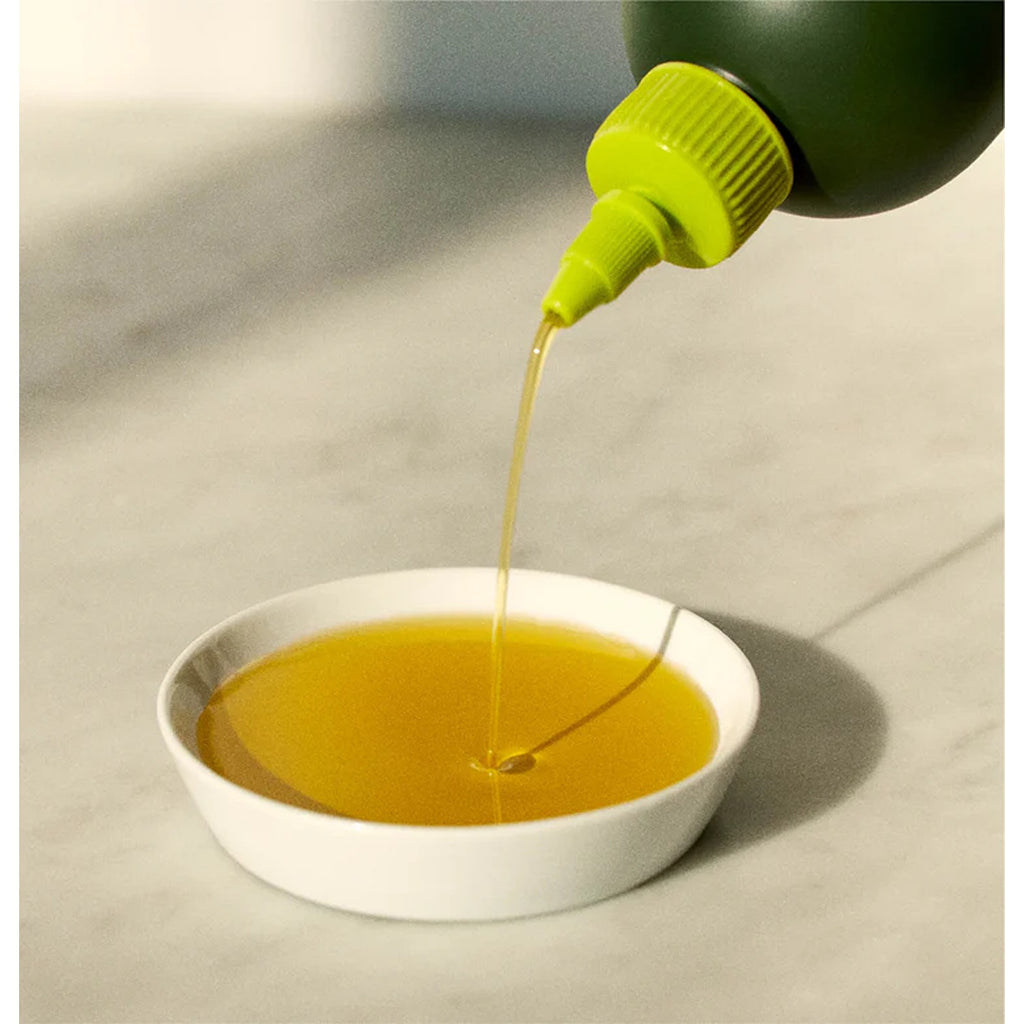 Graza olive oil, a premium, cold-pressed olive oil with a rich, robust flavor, perfect for drizzling over dishes, cooking, or enhancing your favorite recipes.