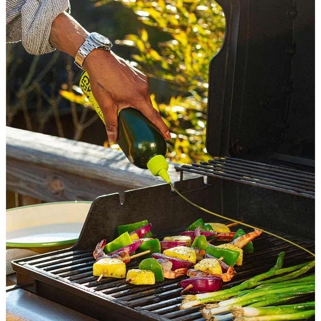 Graza olive oil, a premium, cold-pressed olive oil with a rich, robust flavor, perfect for drizzling over dishes, cooking, or enhancing your favorite recipes.