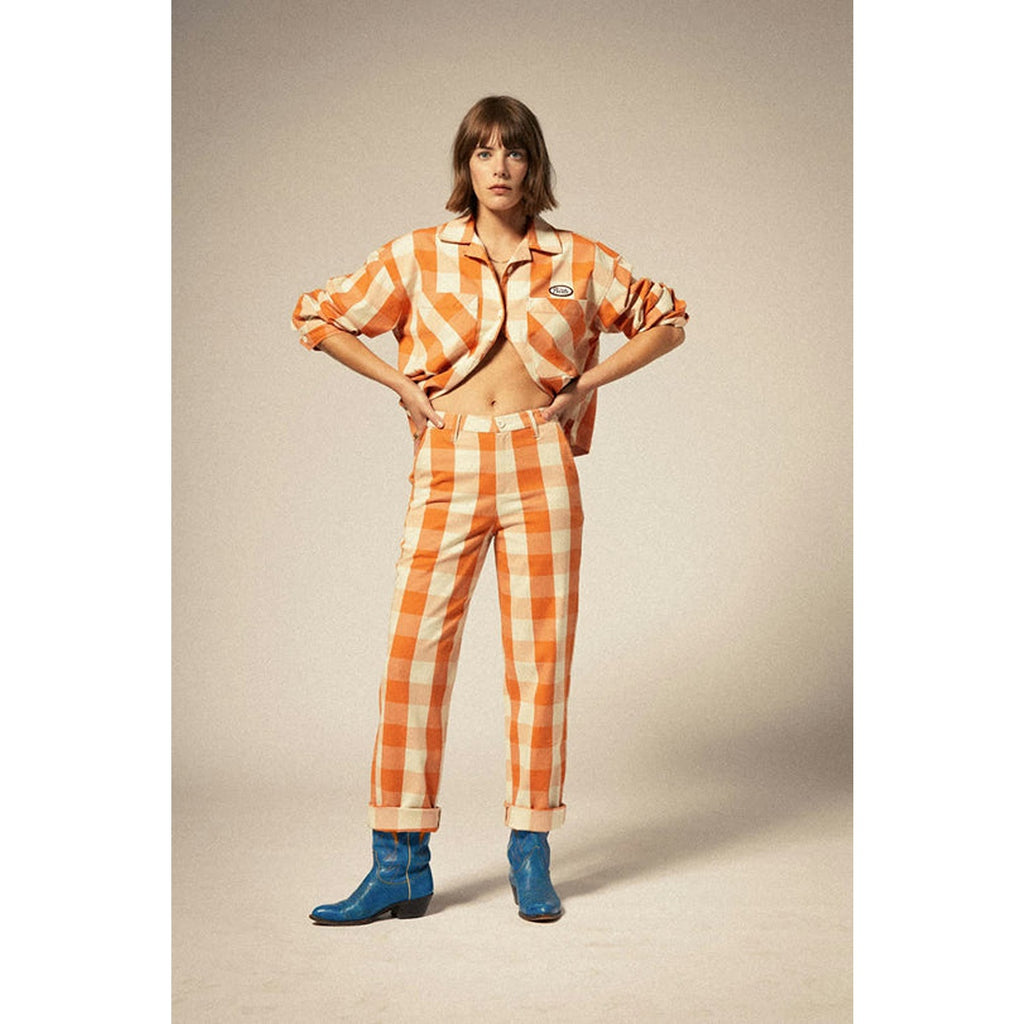 Lightweight, stylish Bedford pants in a tangerine gingham pattern, featuring a relaxed fit and a vibrant checkered design perfect for warm-weather outfits.