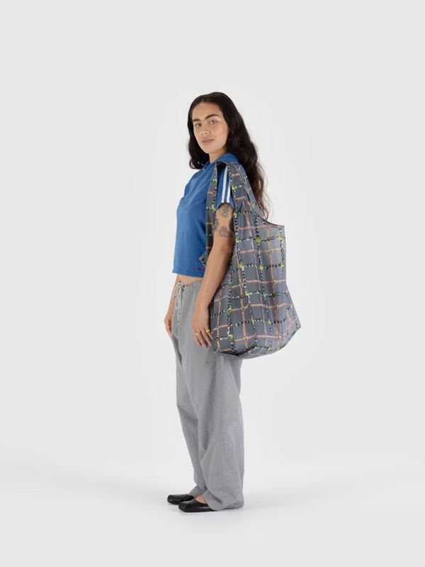 Big Baggu, a spacious and durable tote bag with a simple, versatile design, perfect for carrying larger items or used as an eco-friendly shopping bag.