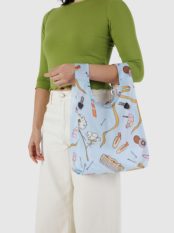 Baby Baggu, a small, lightweight, and versatile tote bag designed for carrying essentials in style, perfect for everyday use or as a mini accessory.