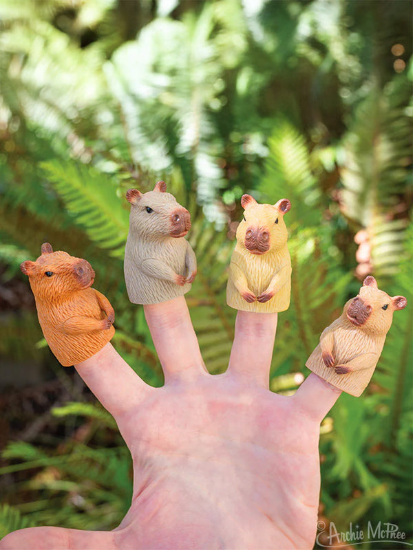 Capybara finger puppets featuring cute, soft designs that fit snugly on your fingers, perfect for playful and whimsical fun.