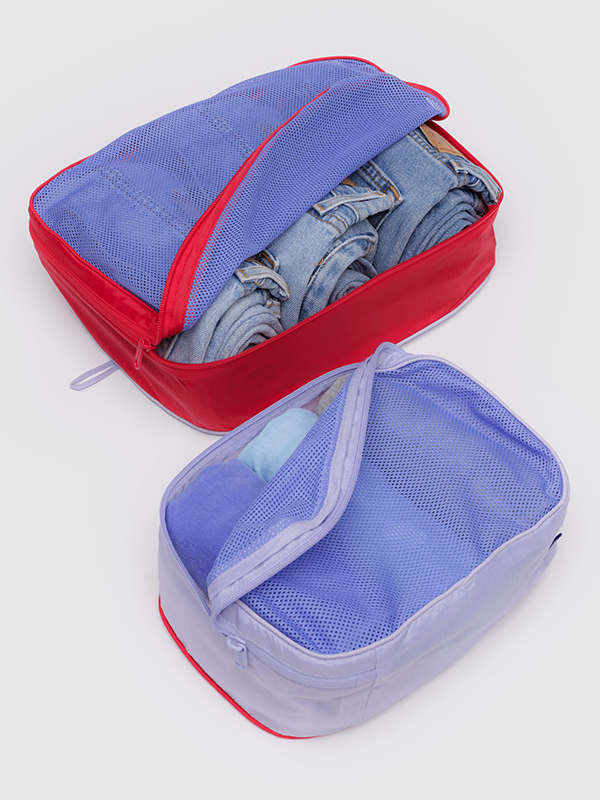 Baggu Packing Cube Set, a set of lightweight, durable cubes designed to help organize and pack your clothes and accessories efficiently for travel.