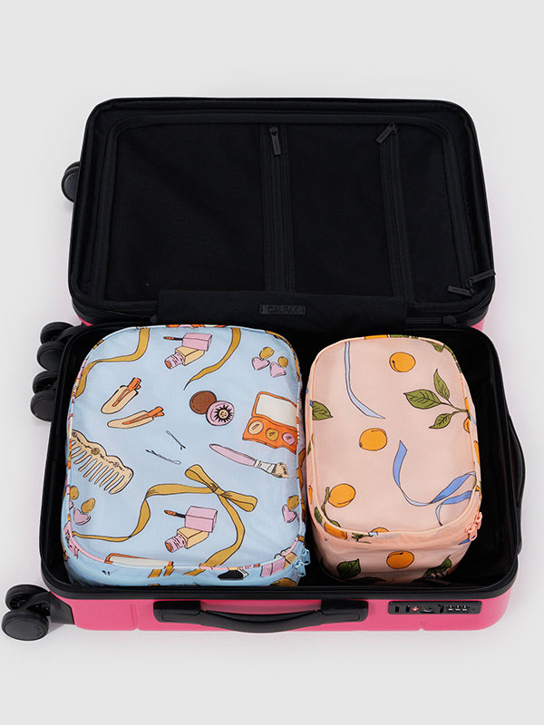 Baggu Packing Cube Set, a set of lightweight, durable cubes designed to help organize and pack your clothes and accessories efficiently for travel.