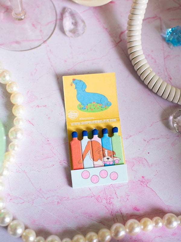 Dog Matchbook – A playful and charming matchbook featuring a fun dog design, perfect for lighting candles or adding a touch of whimsy to your space.