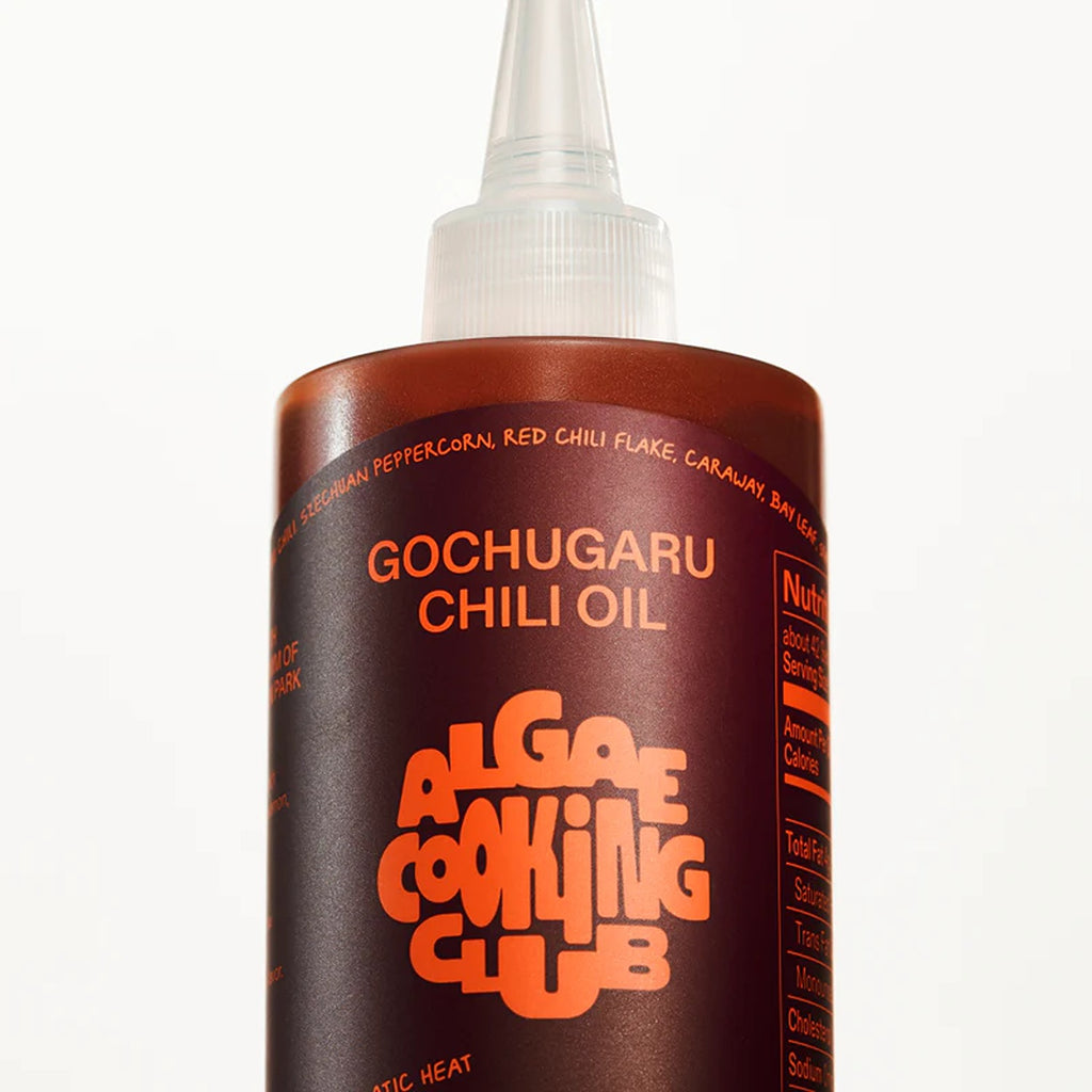 Gochugaru chili oil with a rich, spicy flavor made from Korean red pepper flakes, perfect for adding a bold kick to your dishes.