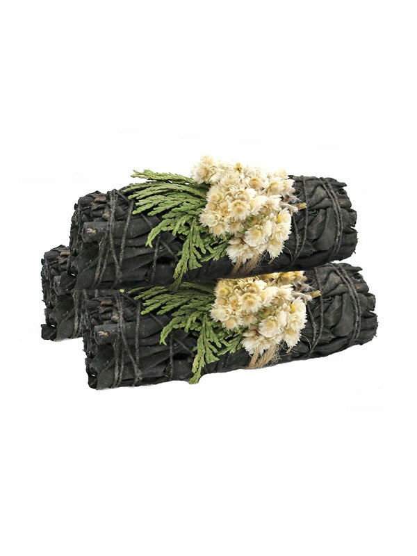 A 4-inch white sage smudge stick, featuring a deep, rich aroma with subtle floral notes. The bundle is carefully wrapped with natural twine, offering a soothing and purifying scent ideal for cleansing spaces and promoting relaxation.