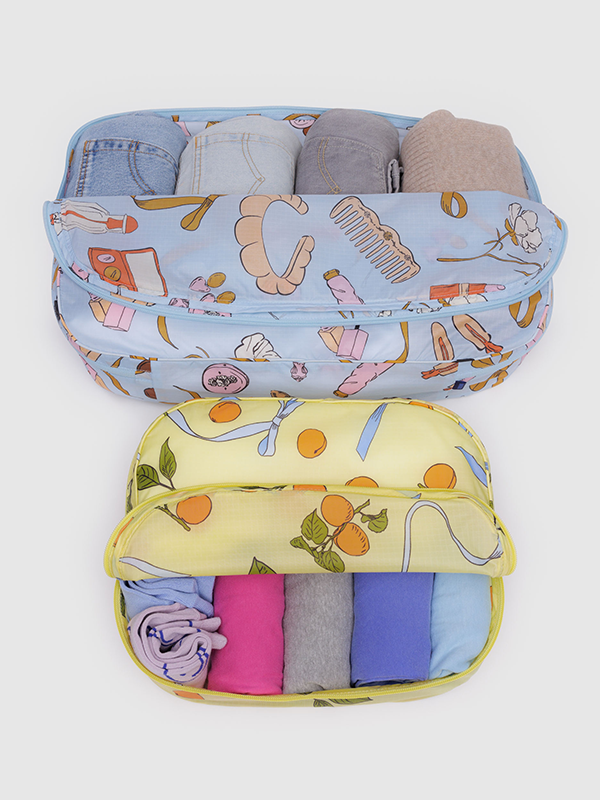 Baggu Packing Cube Set, a set of lightweight, durable cubes designed to help organize and pack your clothes and accessories efficiently for travel.