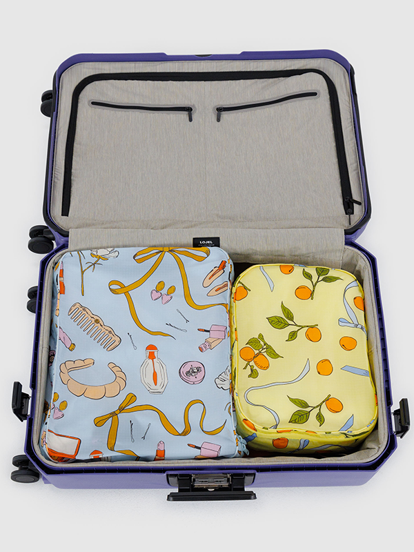 Baggu Packing Cube Set, a set of lightweight, durable cubes designed to help organize and pack your clothes and accessories efficiently for travel.