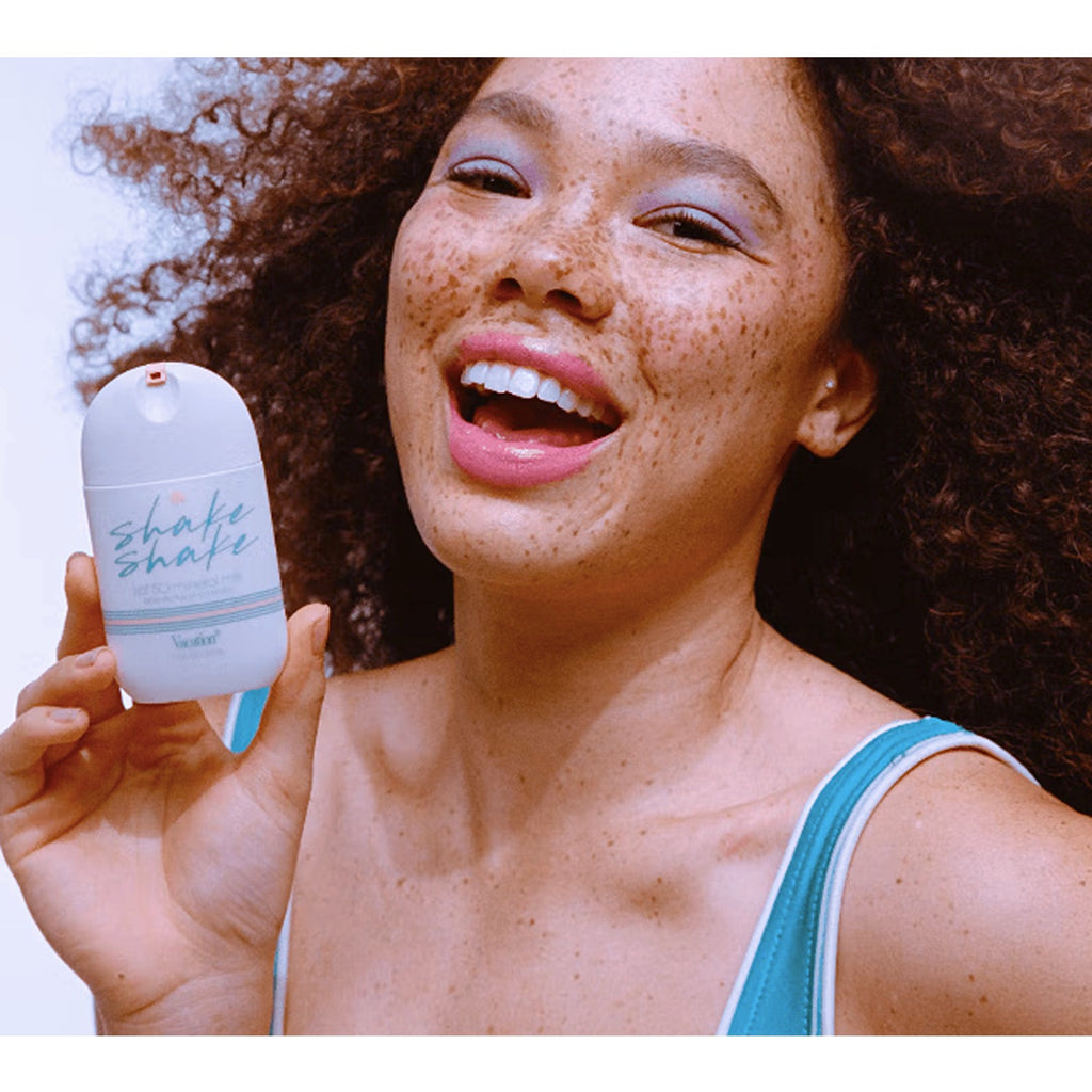 A bottle of Shake Shake Mineral Milk Face Sunscreen SPF 50, offering broad-spectrum sun protection with a lightweight, milk-like texture, ideal for daily use on the face.