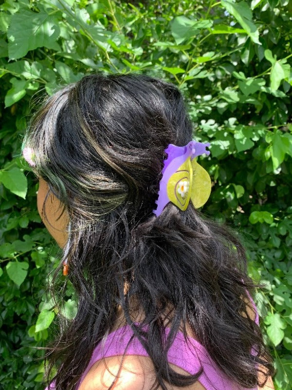 Suzie Snail hair claw featuring an adorable snail design, perfect for adding a whimsical touch while keeping your hair securely in place.