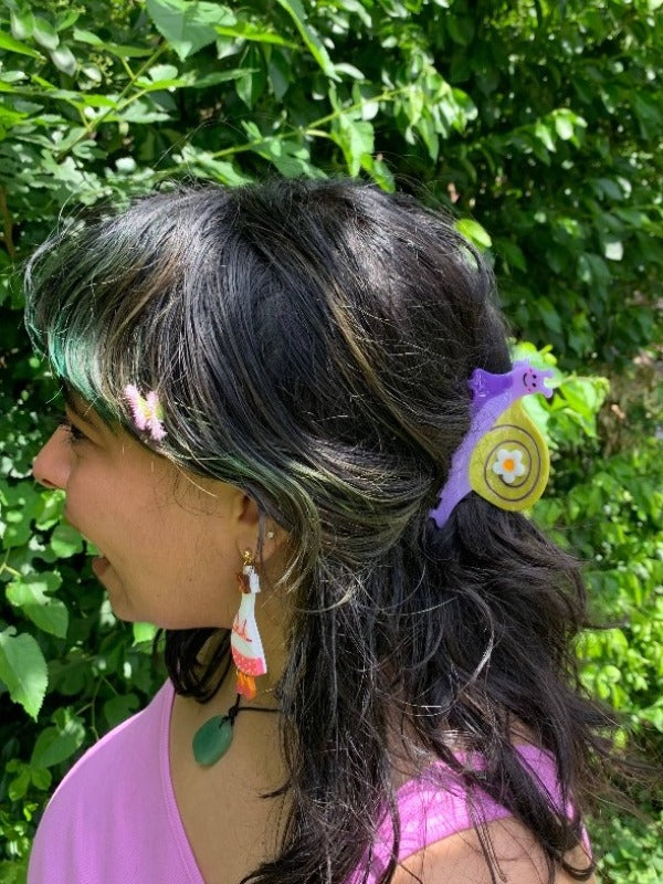 Suzie Snail hair claw featuring an adorable snail design, perfect for adding a whimsical touch while keeping your hair securely in place.