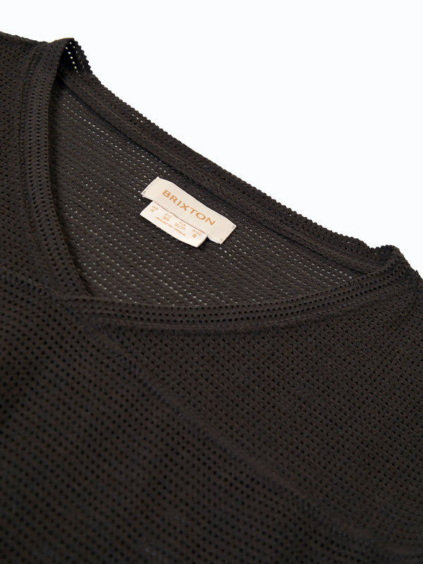 A washed black varsity football mesh tee, featuring a sporty, breathable design with a relaxed fit and a classic mesh fabric, perfect for casual or athletic wear."