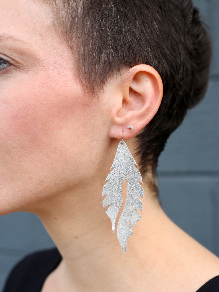 leather feather minis silver edge of urge original earrings