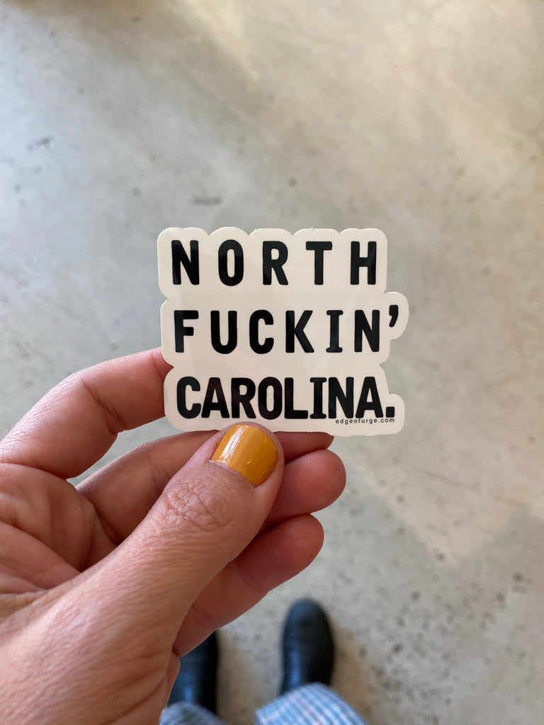 North F*ckin' Carolina Sticker with bold, edgy text, capturing the spirit and pride of the state in a fun, rebellious design.